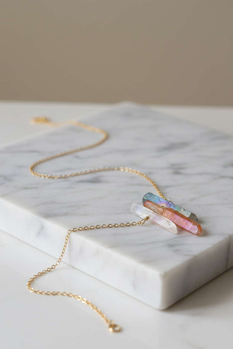 Necklace with colorful pendant on a marble surface