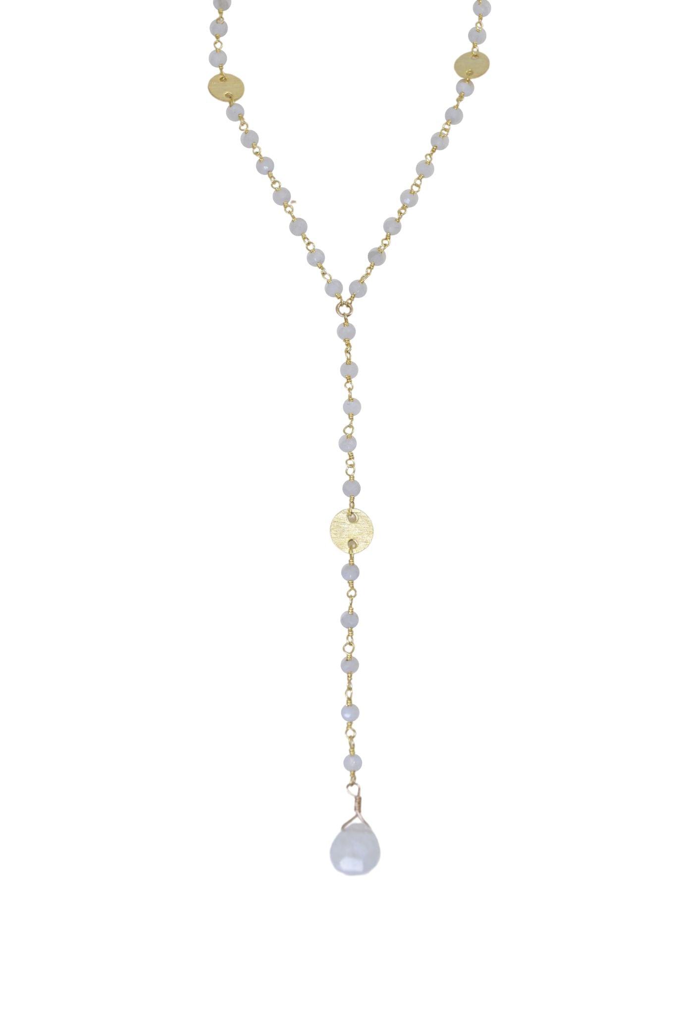 Necklace with gold and pearl beads on a white background